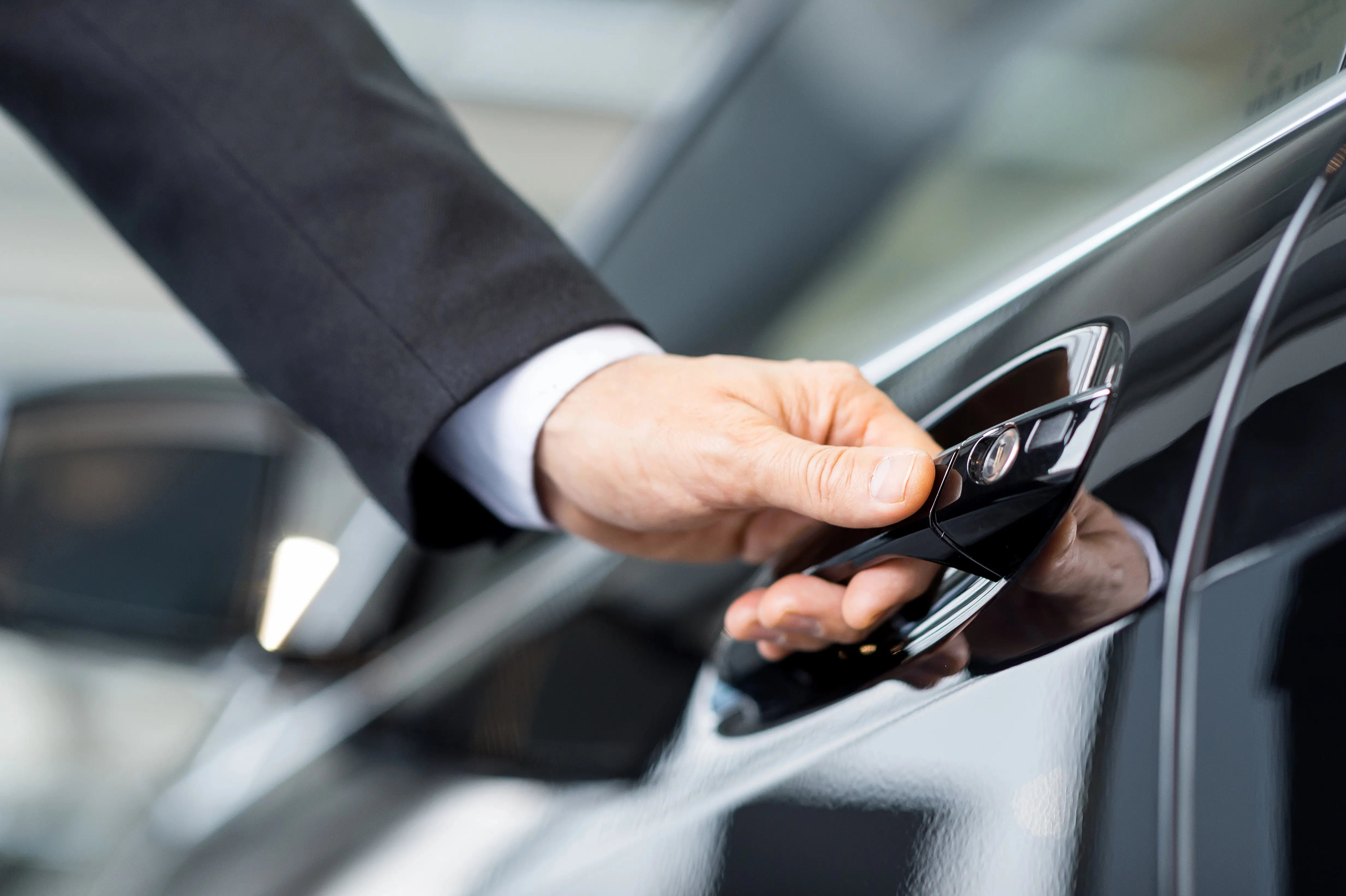 Man opening car door