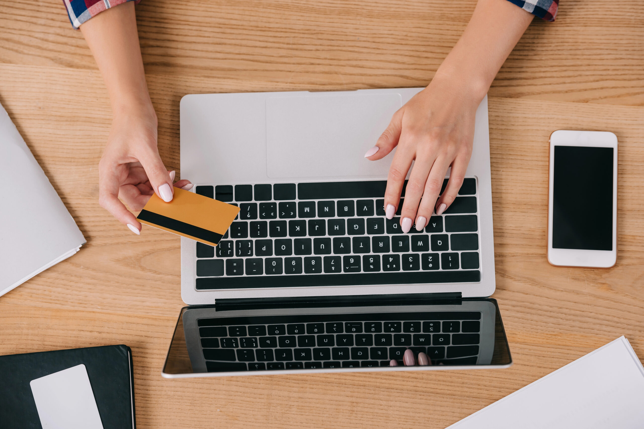 Woman making payment online with credit card