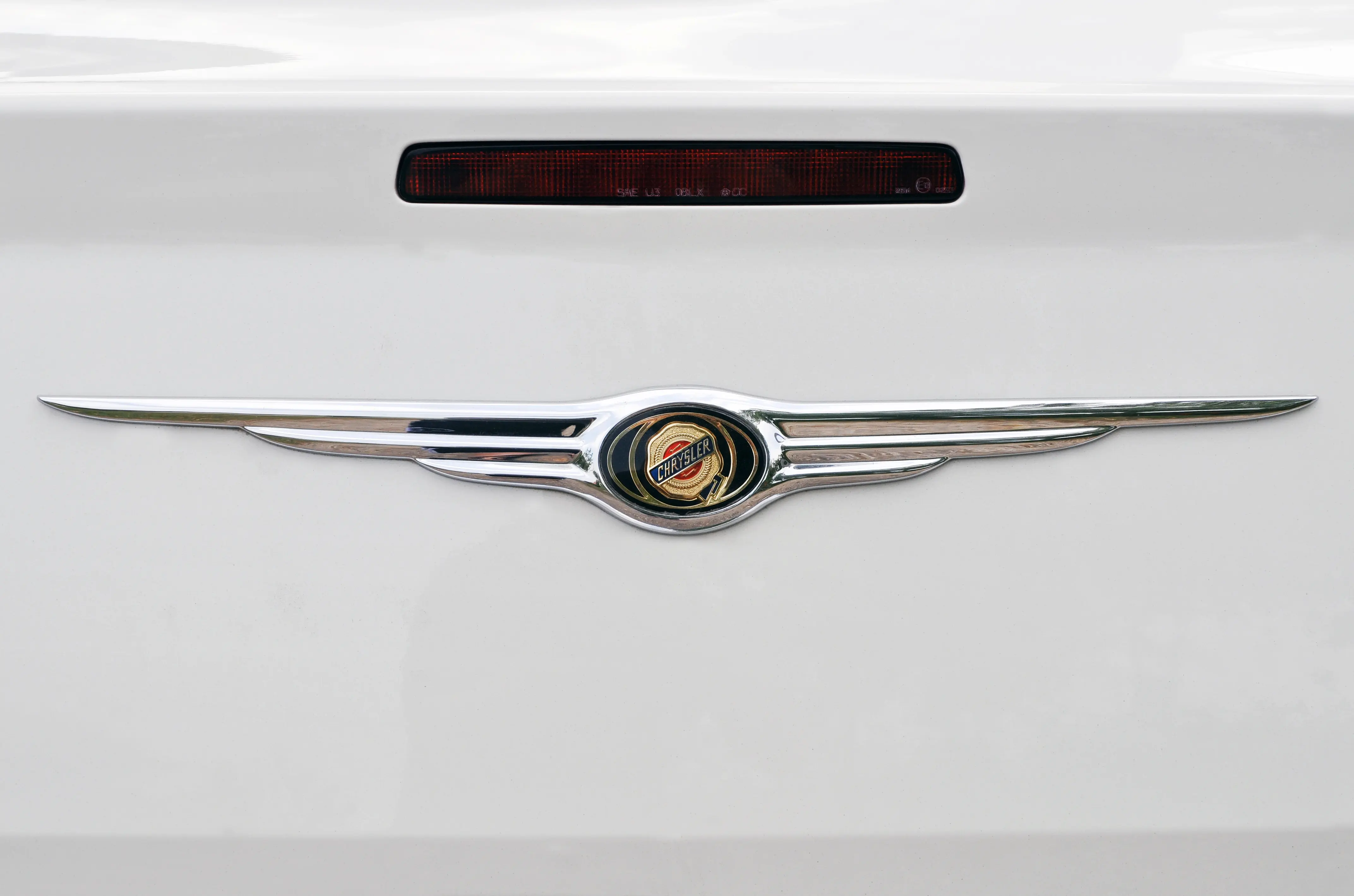 Close up of Chrysler logo on a car