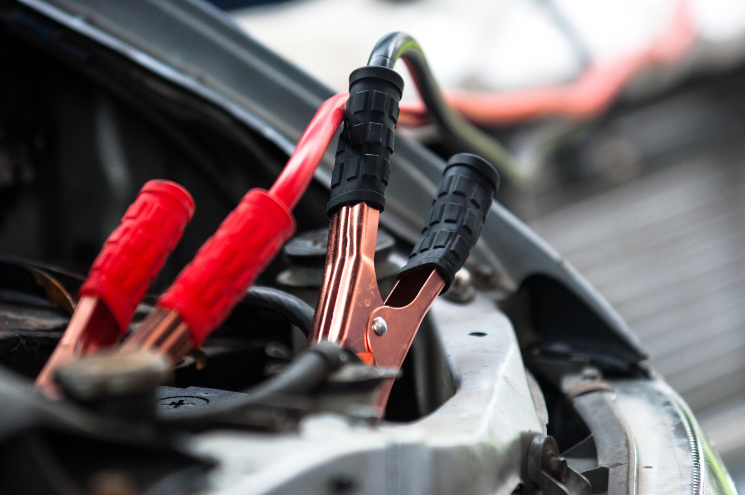 Close up of a car's battery cables