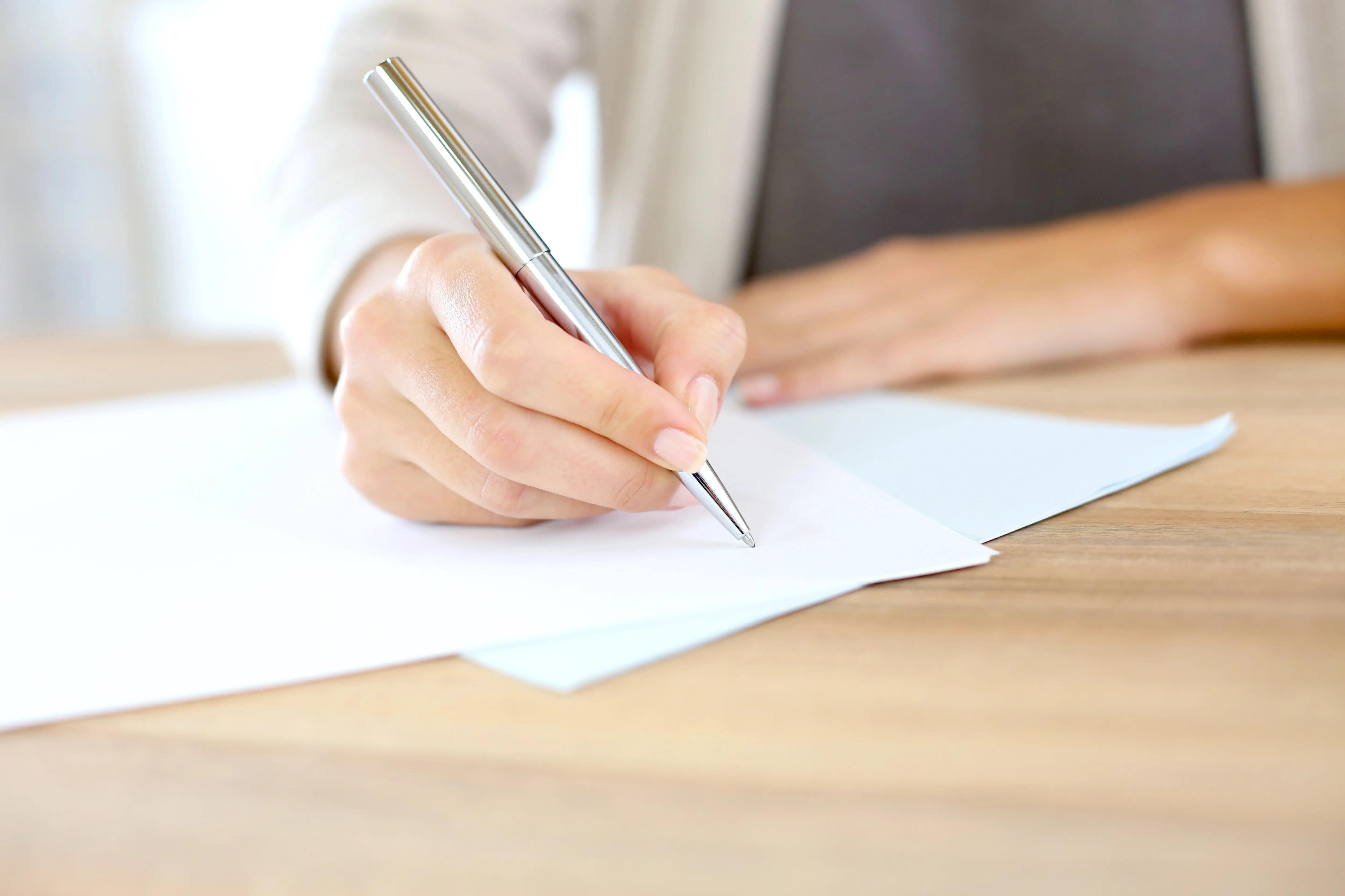 Person writing letter