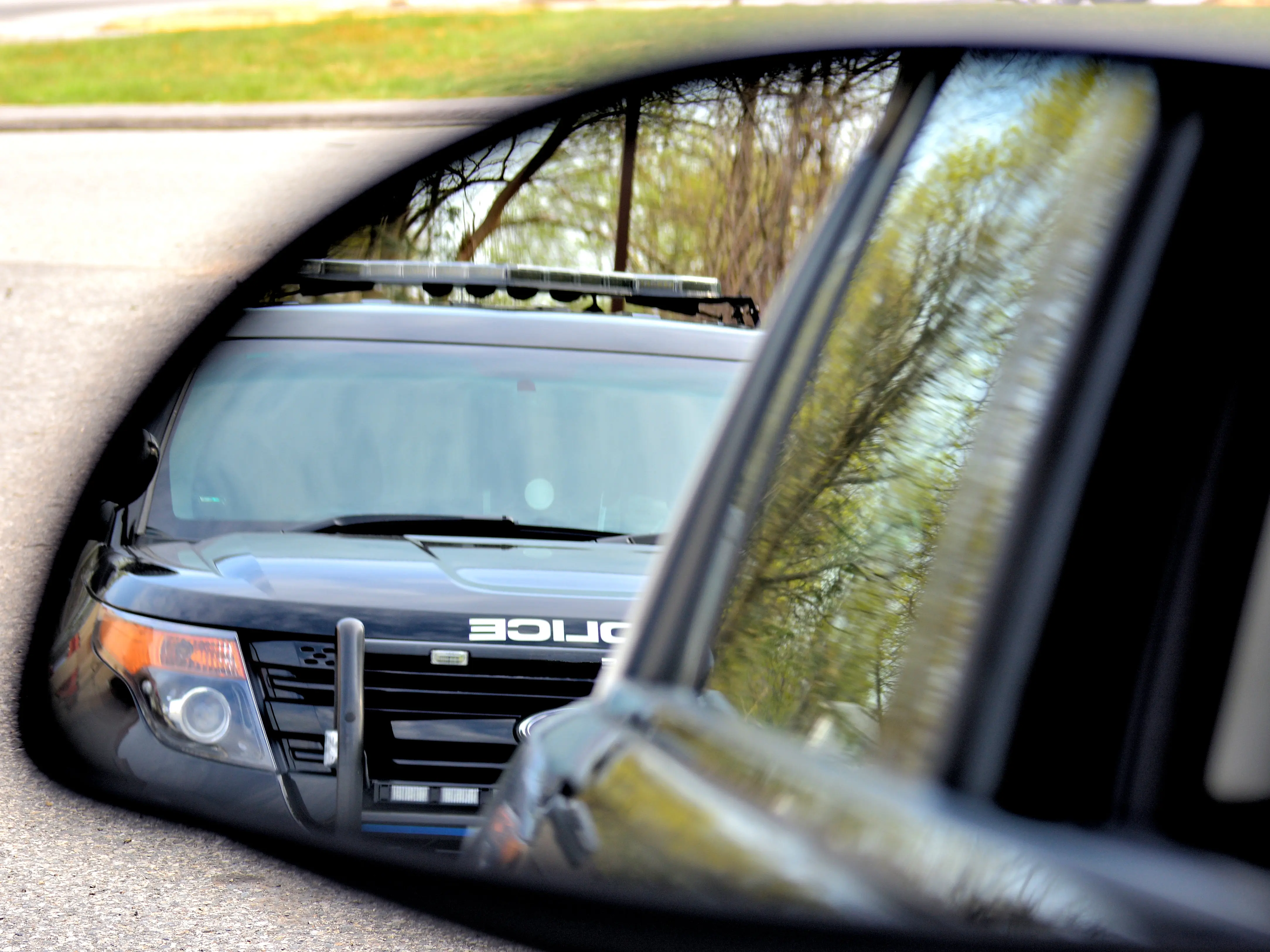 Police pulling over car
