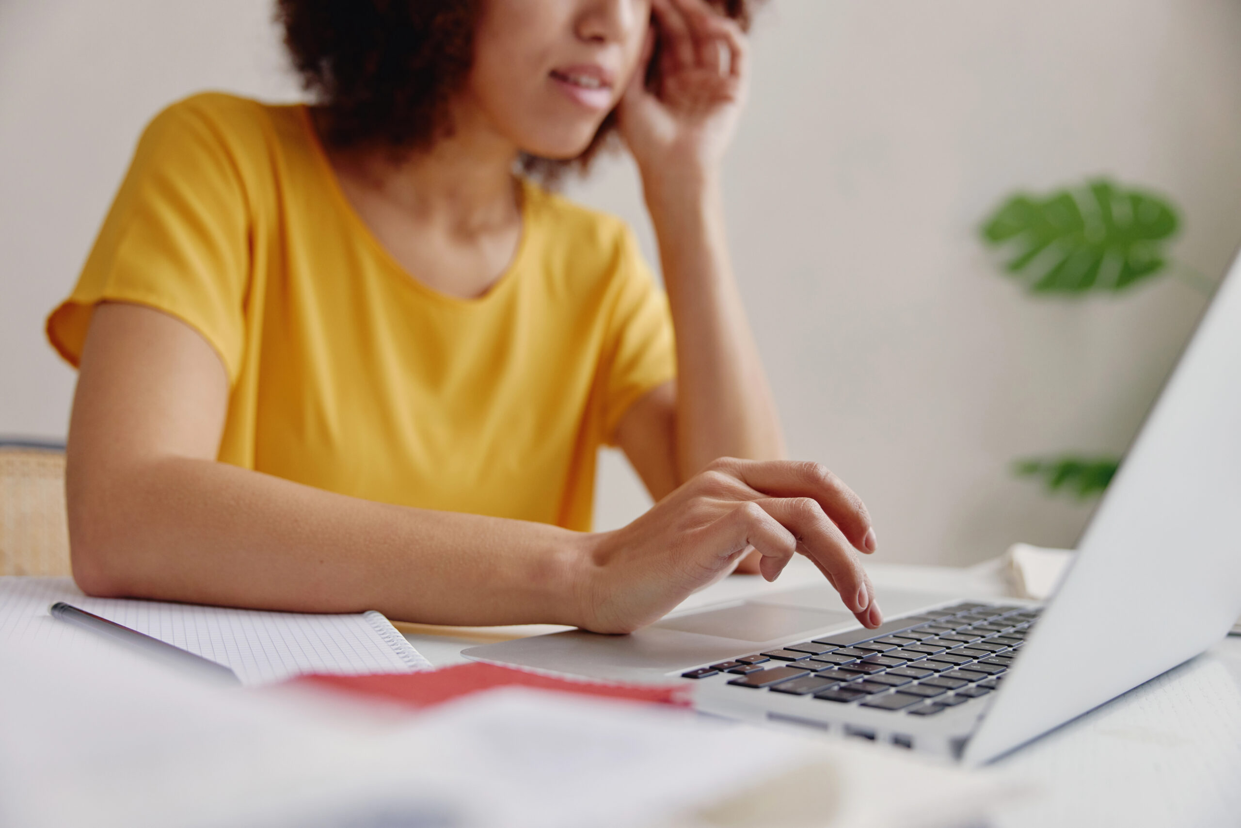 Stressed woman on laptop